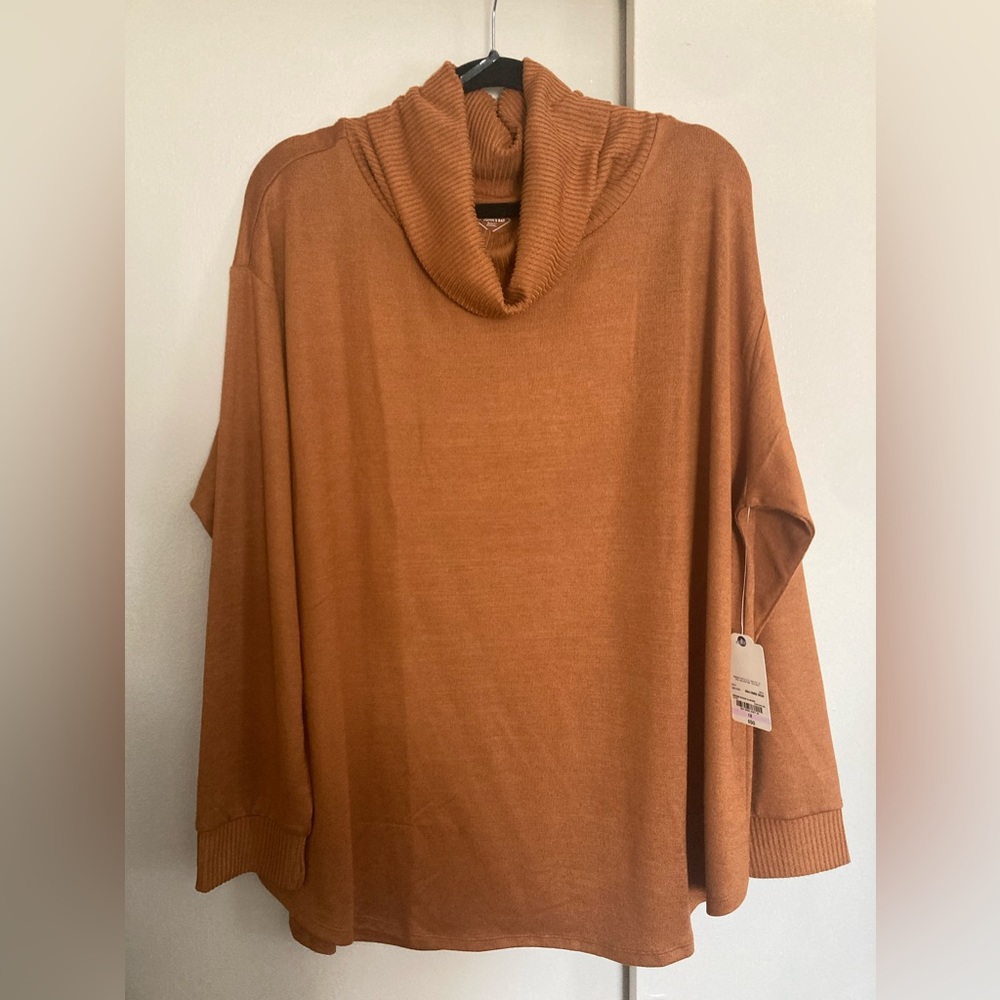 New with tags- St. John burnt orange turtleneck sweater.
